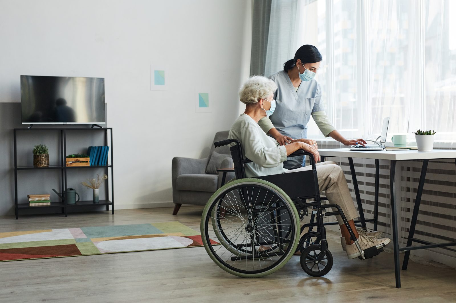 Caregiver and client in a relaxed planning conversation